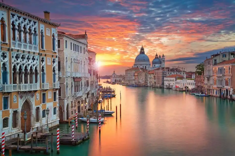 Sunset view of Venice with historic buildings by the water- DDD invoices