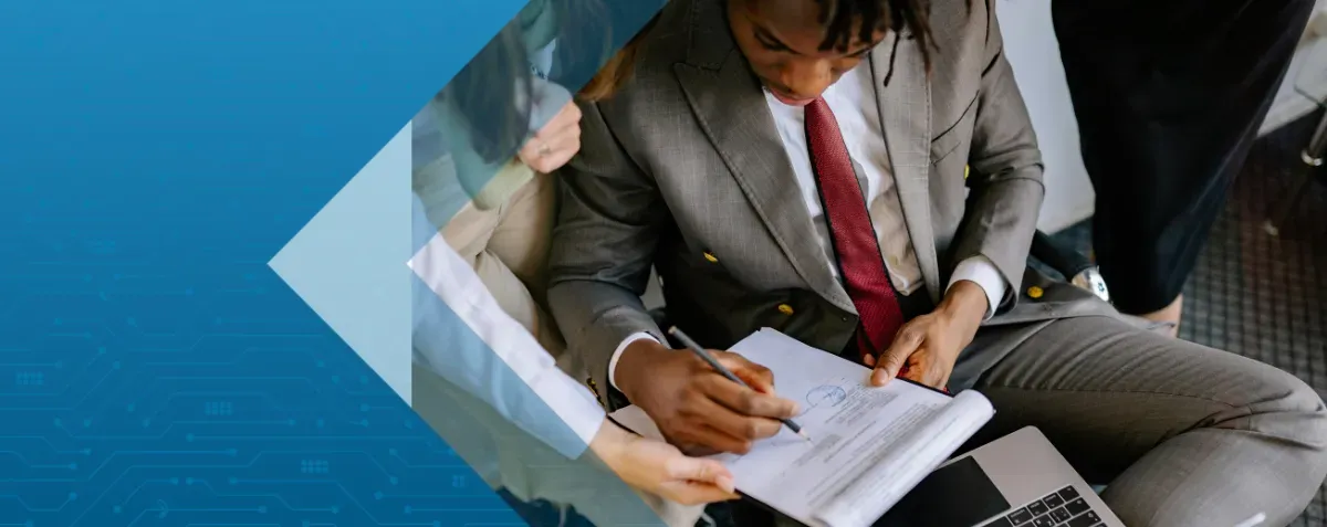 Manager digitally signing invoice in city office