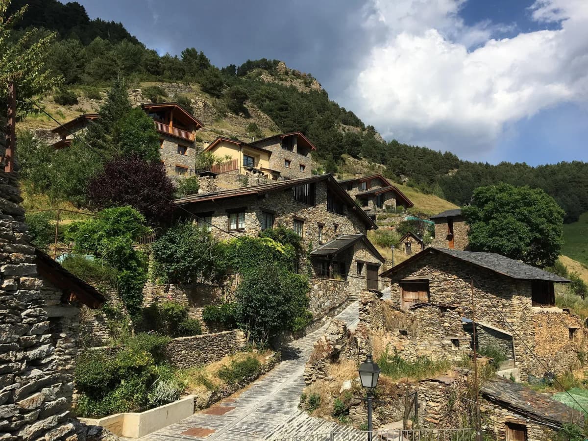 Winding mountain roads and alpine village in Andorra, highlighting the country’s evolving digital invoicing landscape supported by DDD Invoices’ API solution.