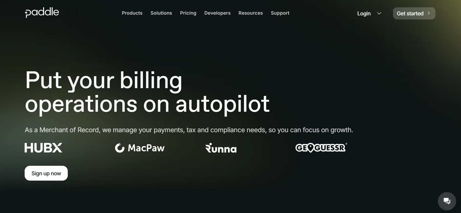 Alt text: Paddle homepage with billing headline, client logos, and ‘Sign up now’ button.