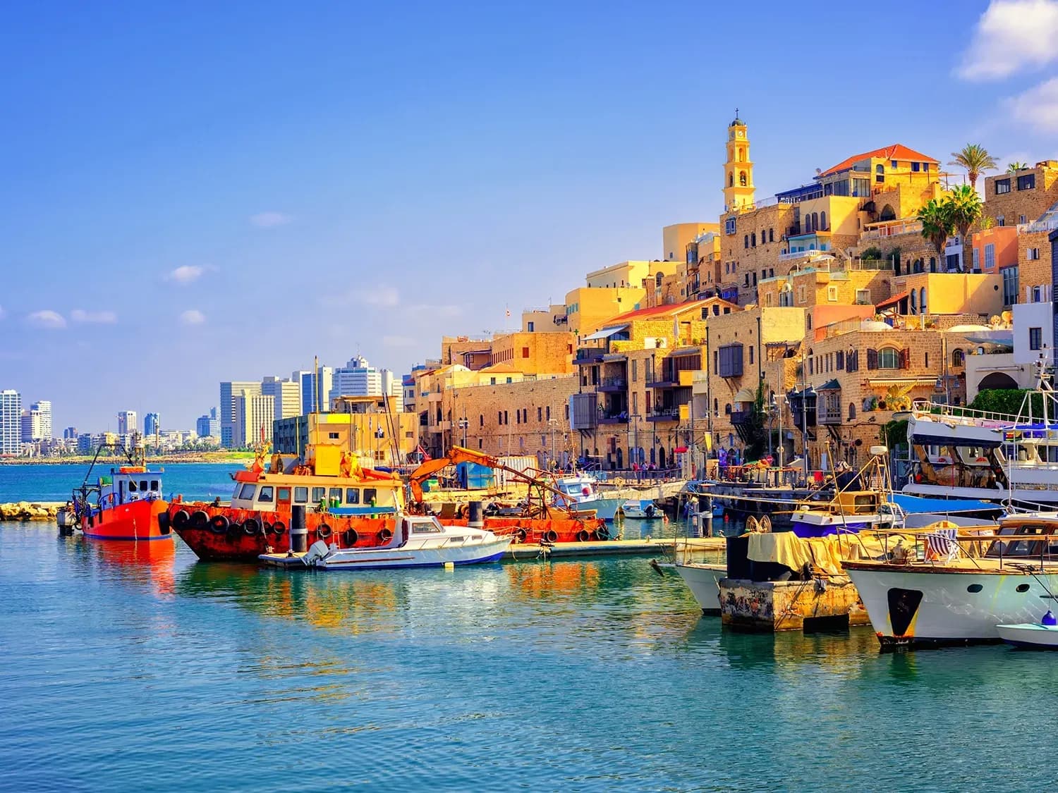 DDD Invoices supporting fiscalisation in Israel, featuring the historic port of Jaffa with stone buildings, boats, and the Mediterranean coastline.