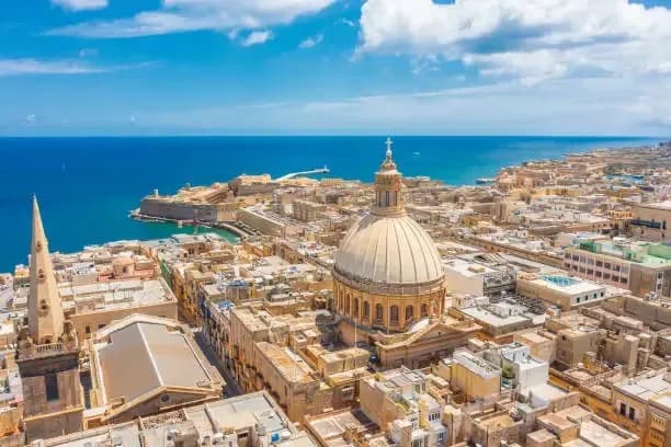 DDD Invoices fiscalization, VAT compliance, and e-invoicing solutions illustrated by the historic skyline and Grand Harbour view of Valletta, Malta