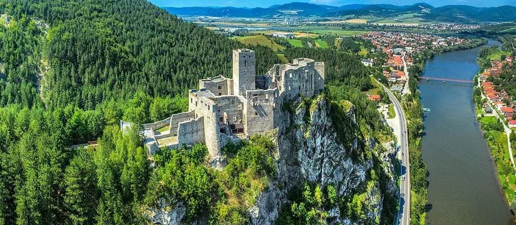 Colorful riverside buildings along the river in slovakia, as the country moves toward mandatory e-invoicing with API support from DDD Invoices.