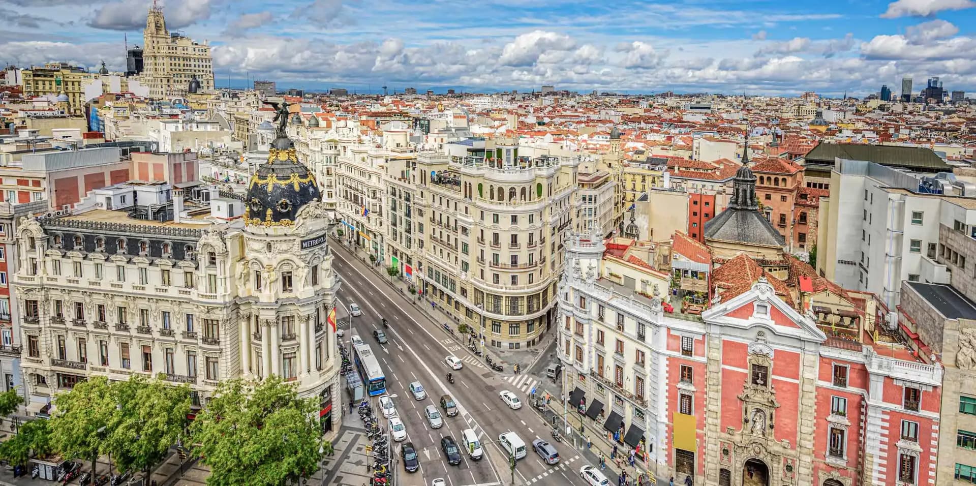 Aerial view of Madrid’s Gran Vía with historic buildings and busy streets, symbolizing Spain’s digital transformation with solutions like DDD Invoice.