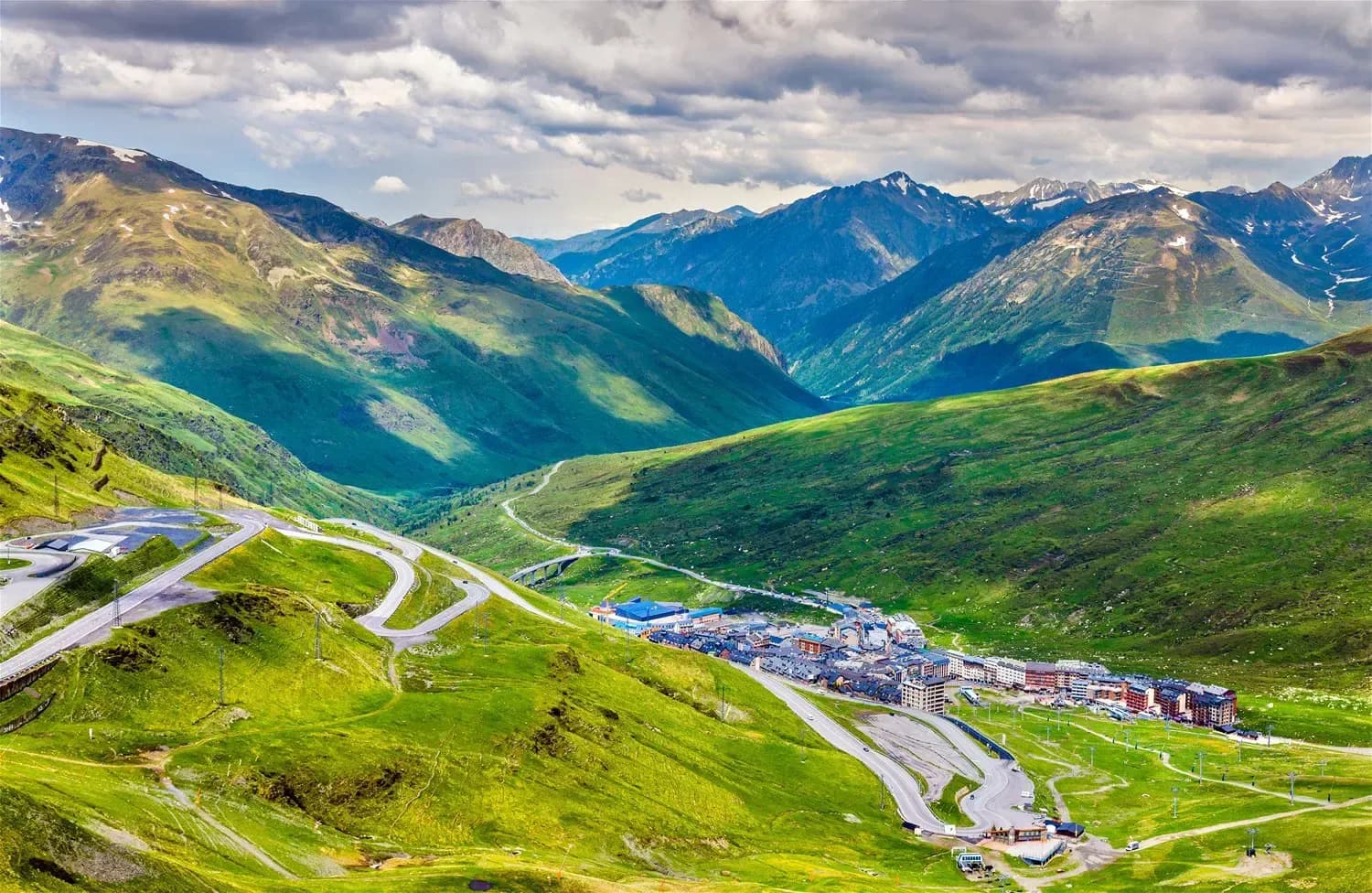 Winding mountain roads and alpine village in Andorra, highlighting the country’s evolving digital invoicing landscape supported by DDD Invoices’ API solution.