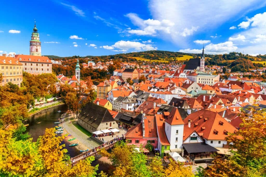Historic townscape in the Czech Republic with red-roofed buildings and a riverside view, reflecting the country’s e-invoicing framework supported by DDD Invoices.