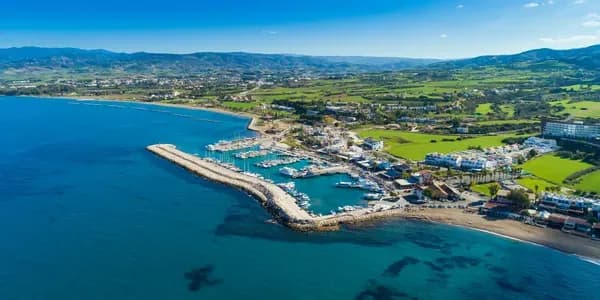 Crystal-clear waters and golden sands of Cyprus’ coastline, capturing the island’s sunny charm where tourism meets digital innovation with DDD Invoices leading the e-invoicing transformation.