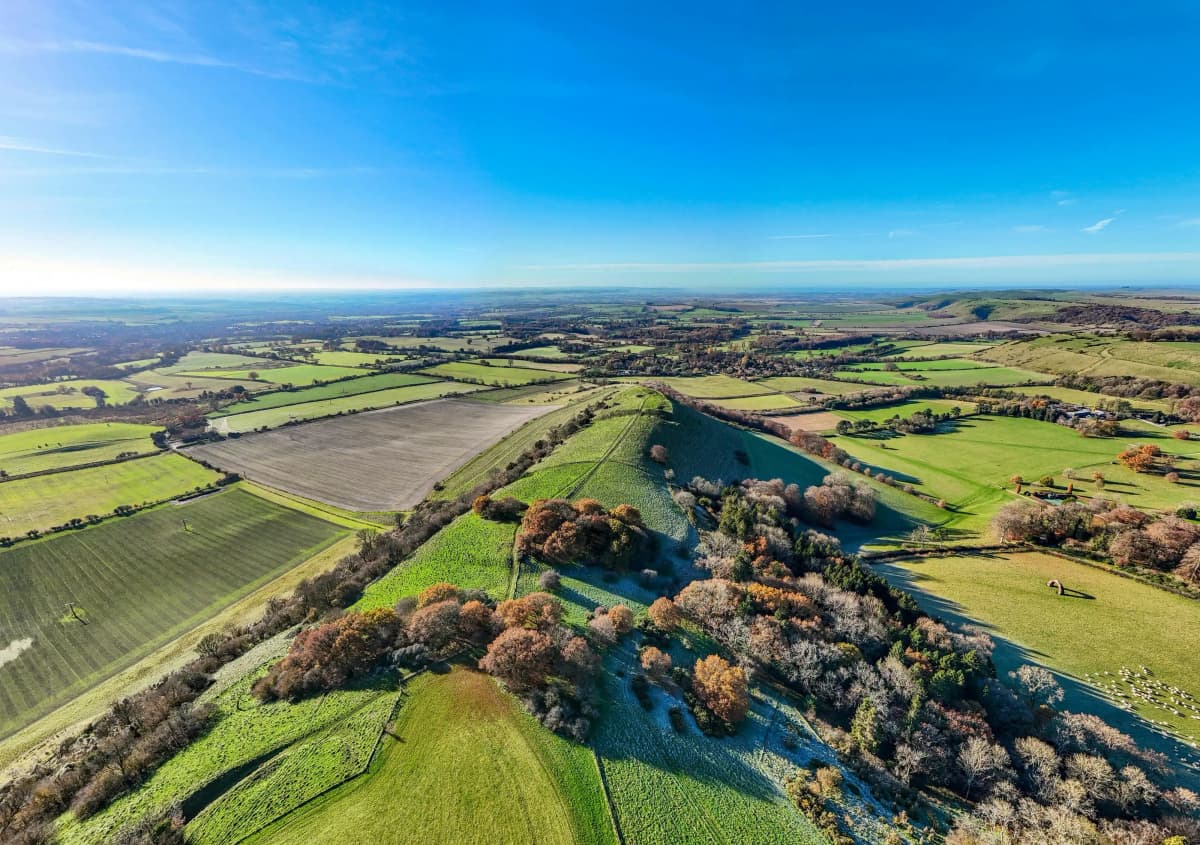 An aerial view of english country side, Pewsey in the United Kingdom, that will eventually adhere to the Fiscalization and real-time VAT compliance powered by DDD Invoices
