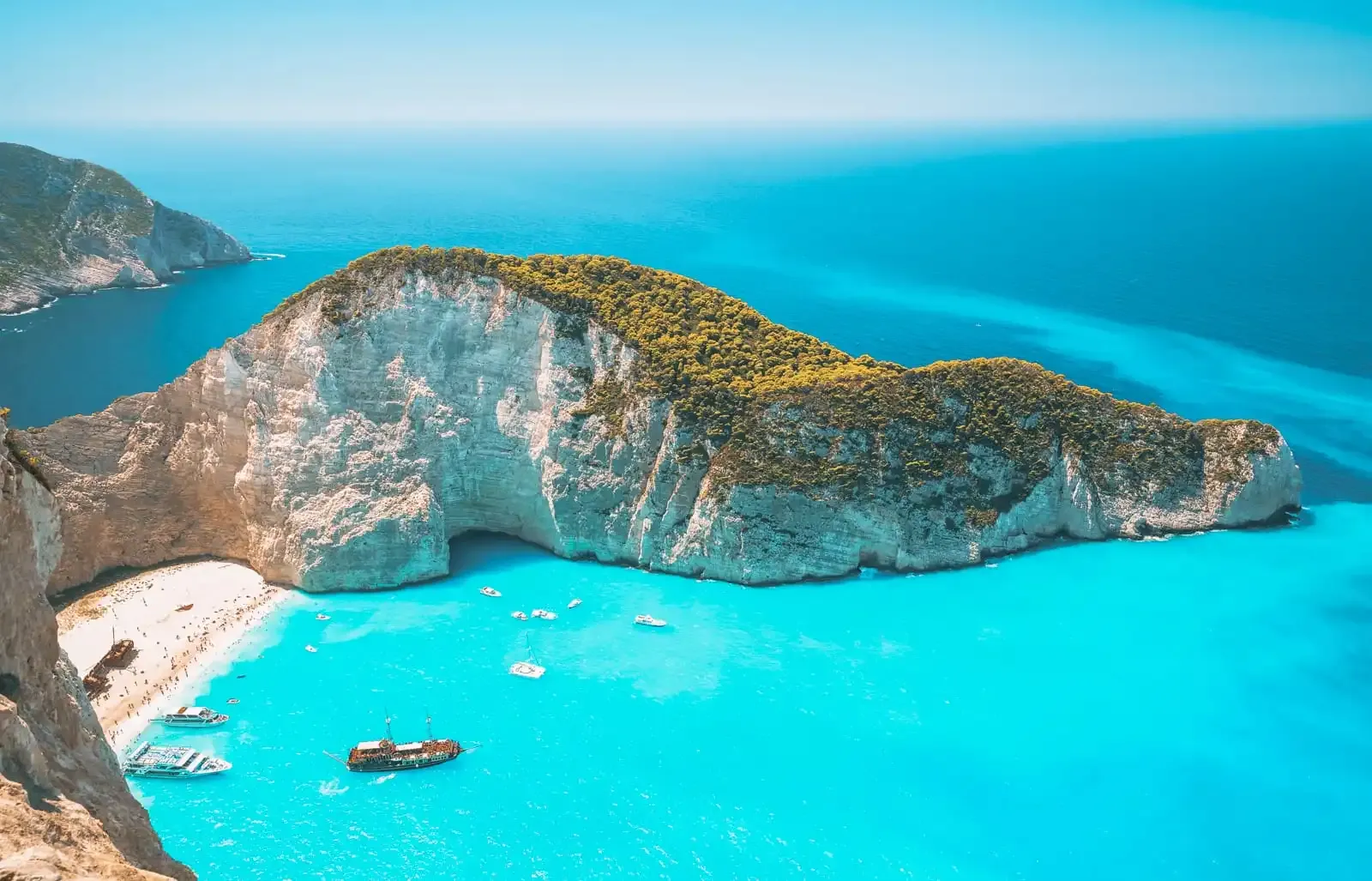 Beach in Zakynthos, Greece, known for its shipwreck and turquoise waters, as Greece embraces digital transformation with DDD Invoices enabling seamless e-invoicing.